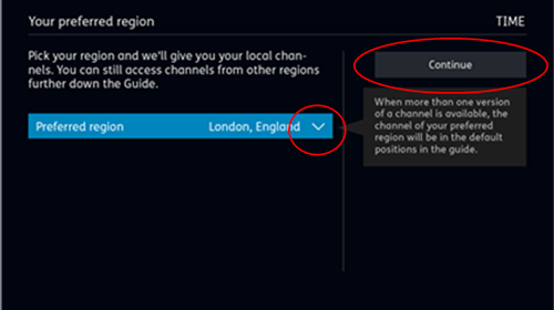 TV screen showing the region option and continue button